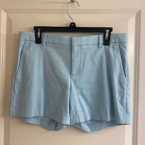 Plain turquoise short-4 pockets.